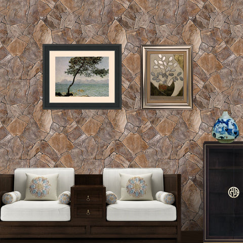 stone wallpaper with brown sofa