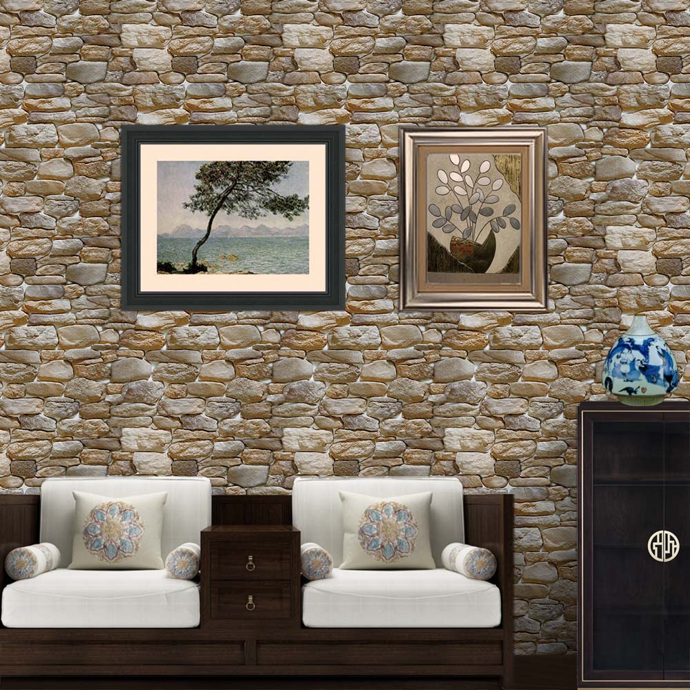 warm stone wall with brown sofa